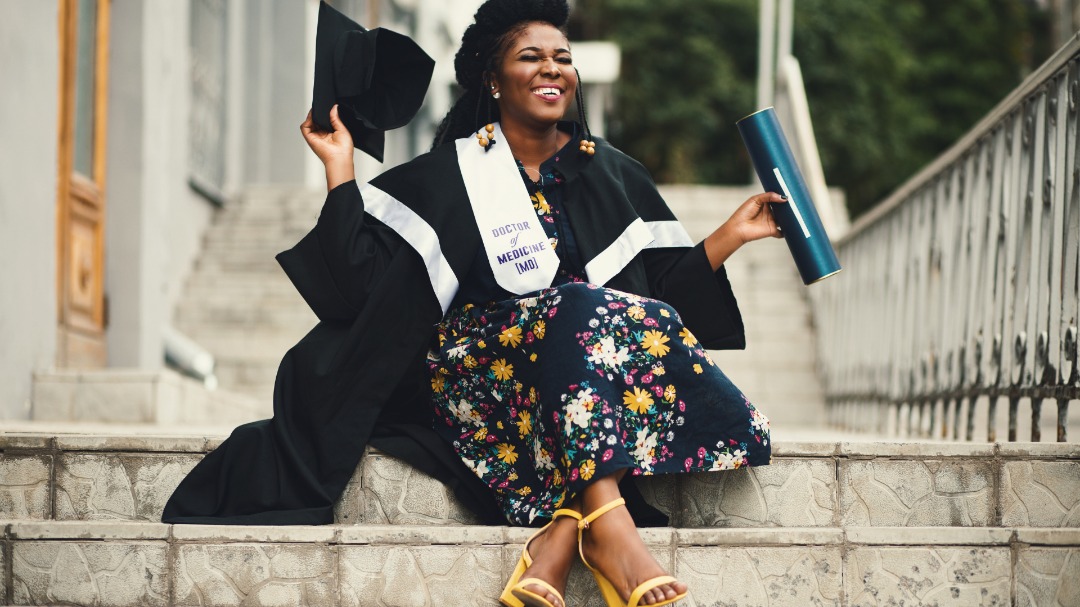 a black woman graduating