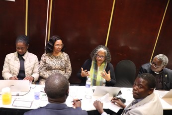 A photo of delegates participating in group work during the workshop